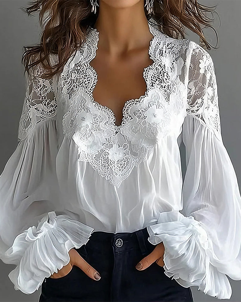 Patchwork-bluse i blonder med V-udskæring