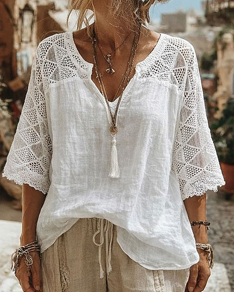 Bluse med V-hals og striber