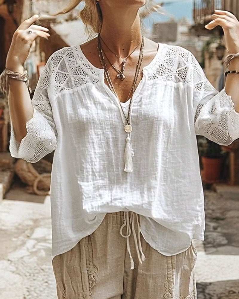 Bluse med V-hals og striber